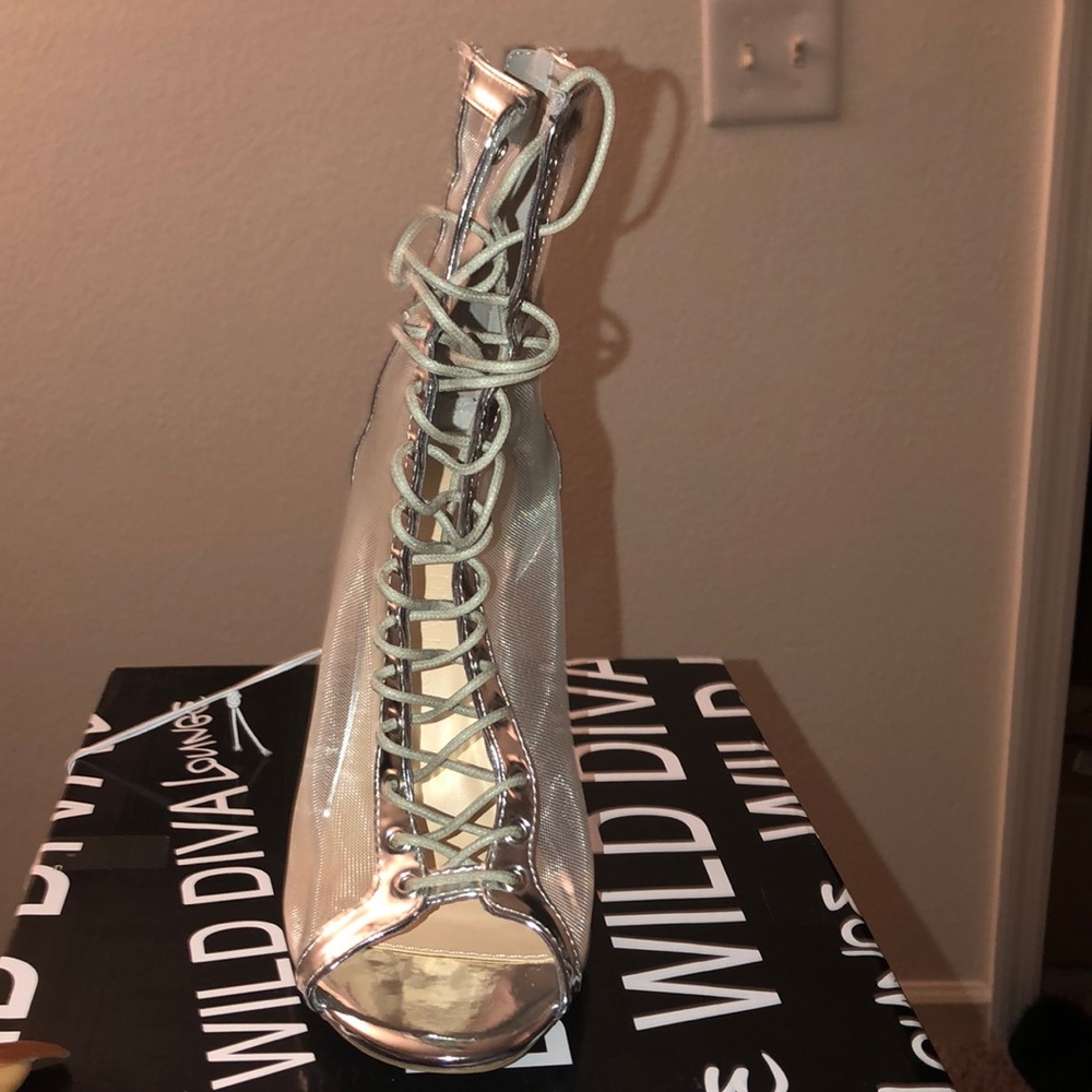 Clear metallic heels.